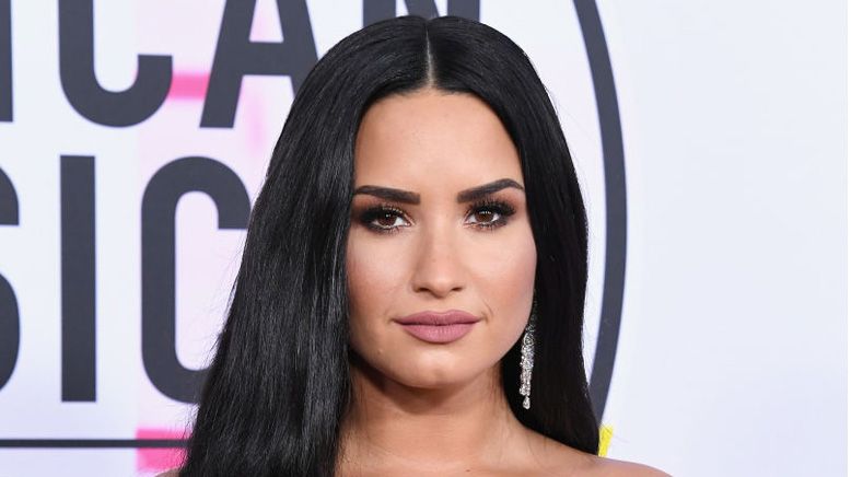 Demi Lovato shares a wedding dress snap and fans are confused ...