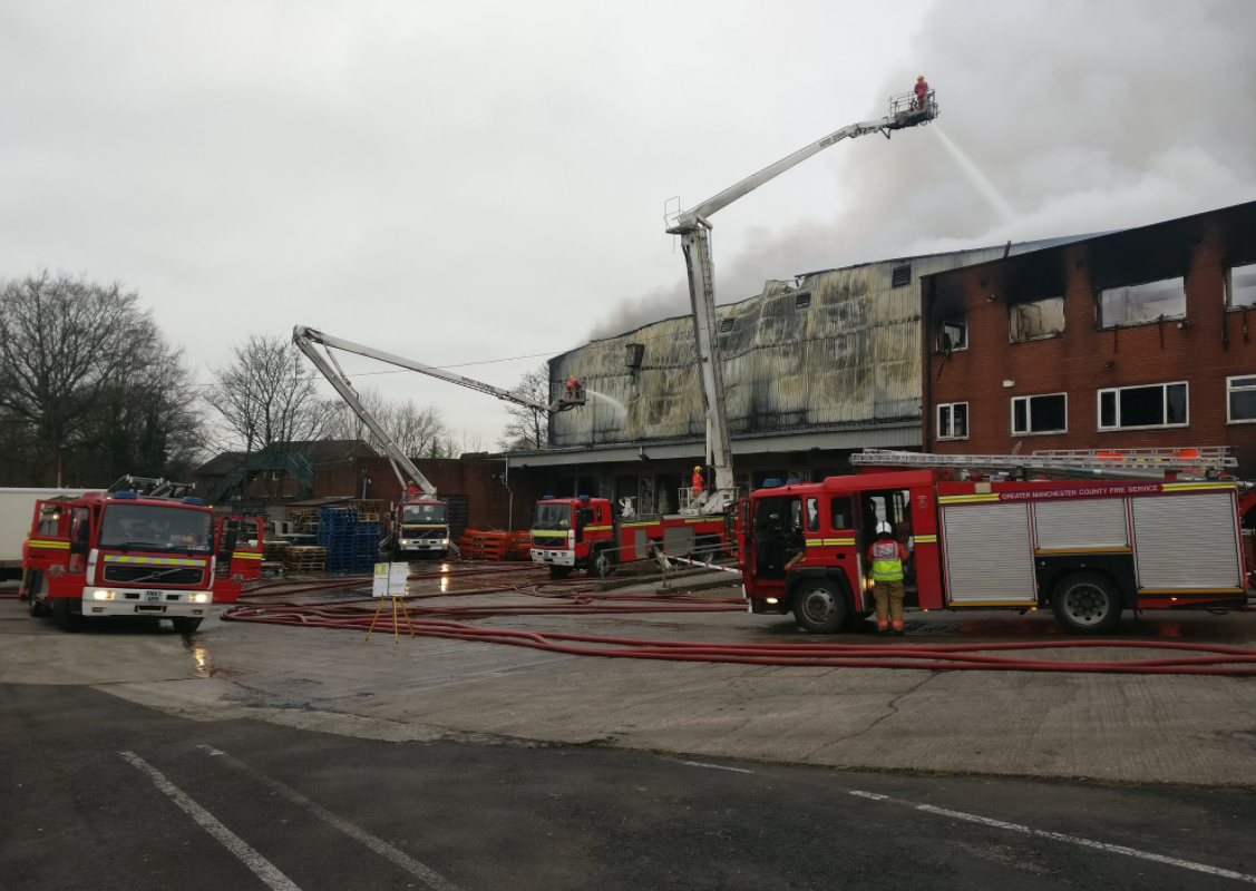 VIDEO: Huge textiles warehouse goes up in flames in Rochdale | News ...