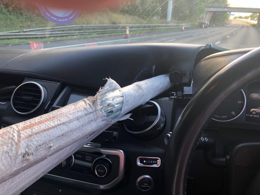 Shocking Pictures Show Drivers Lucky Escape After Poles Smashed Through Window News 