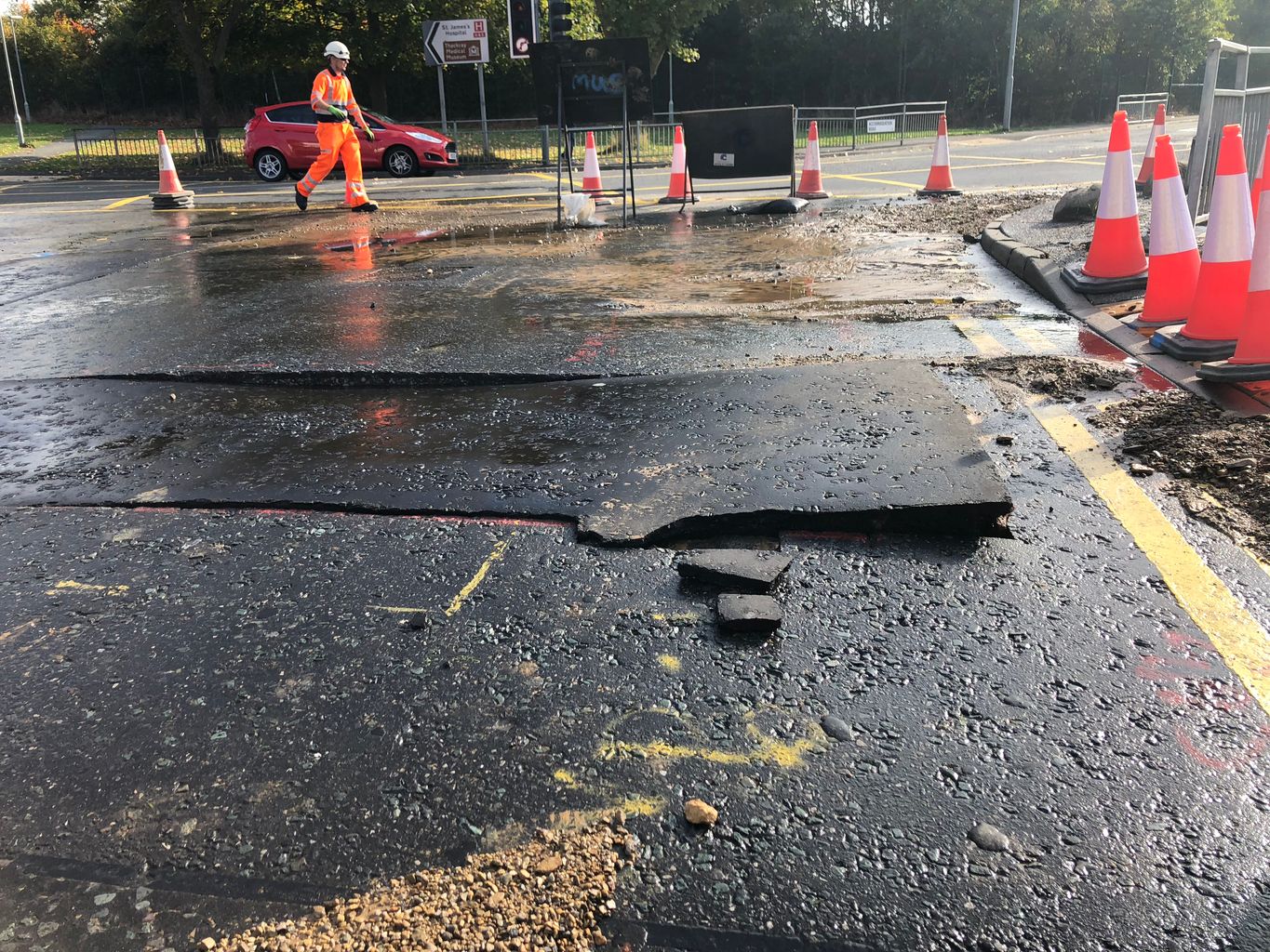 Major water main burst shuts road and causes flooding | News - Greatest ...