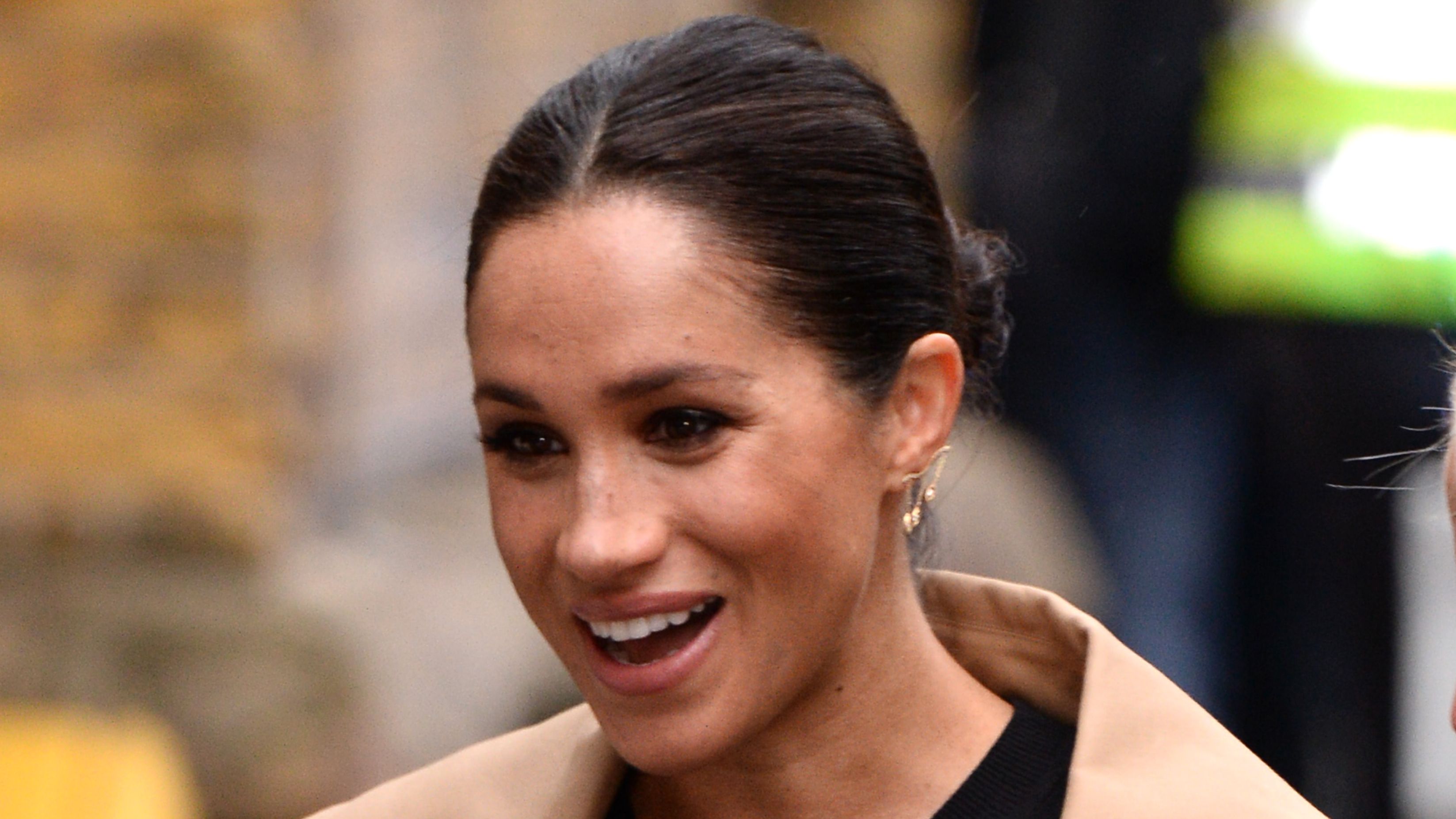 Meghan Markle looks stunning as she shows off growing baby bump on Meghan Markle looks stunning as she shows off growing baby bump on