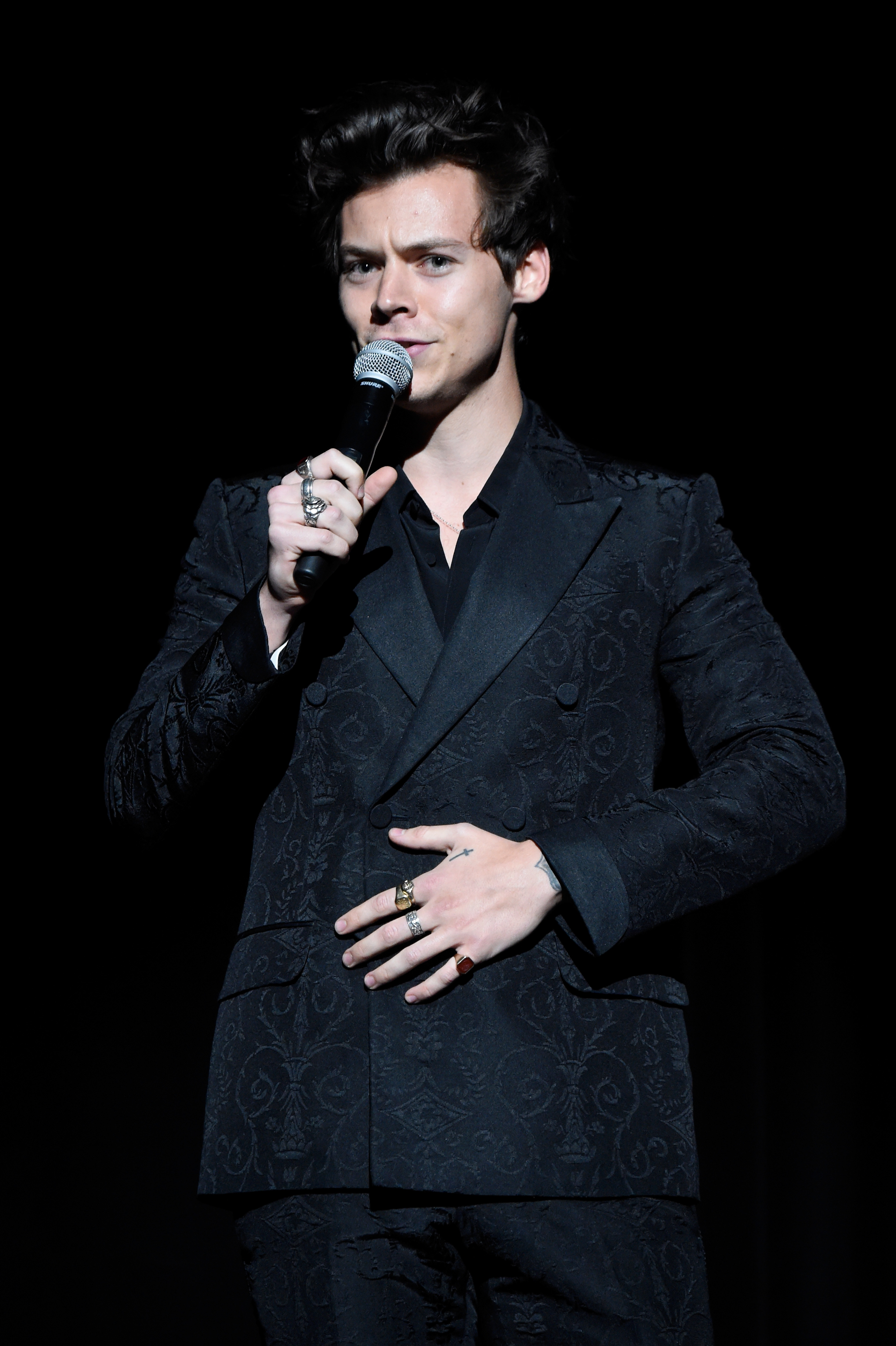 One Direction super fan gets Harry Styles tattooed on her face