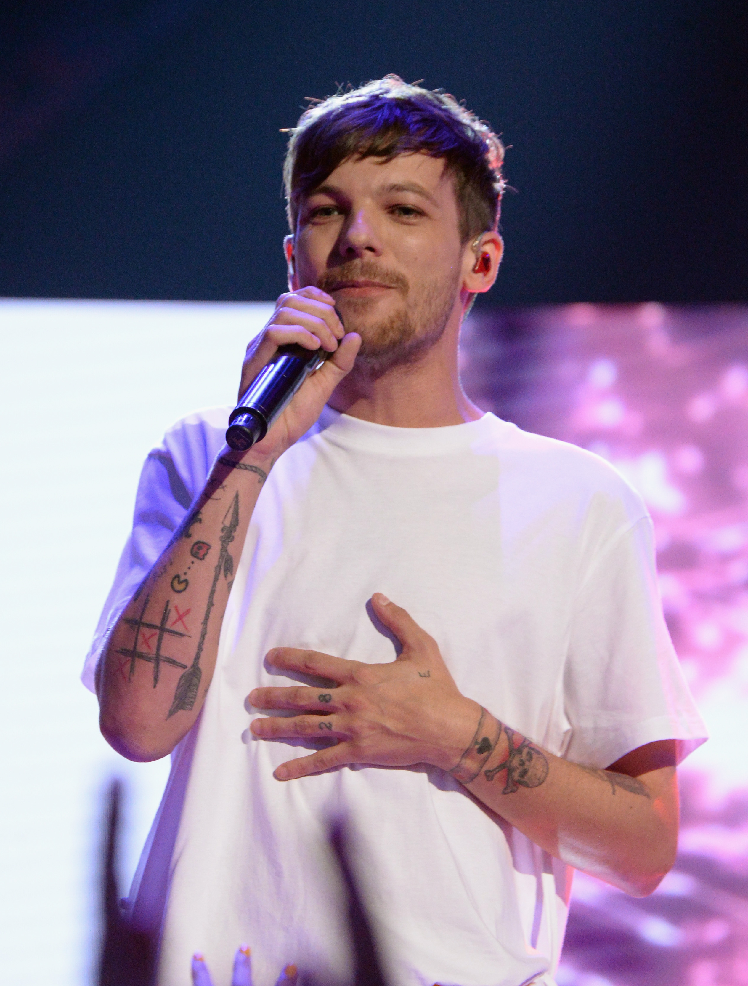Louis Tomlinson Teases New Song 'Two Of Us': Watch