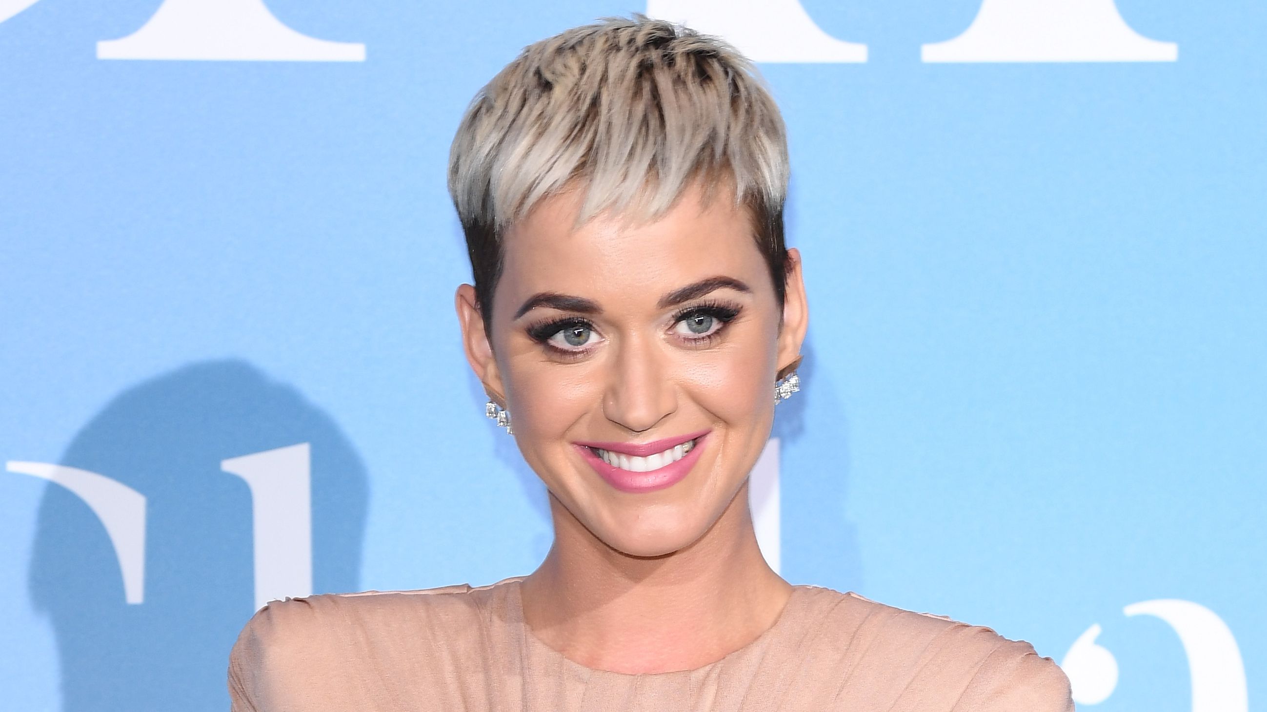 Katy Perry ditches pixie cut as she shows off stunning long hair