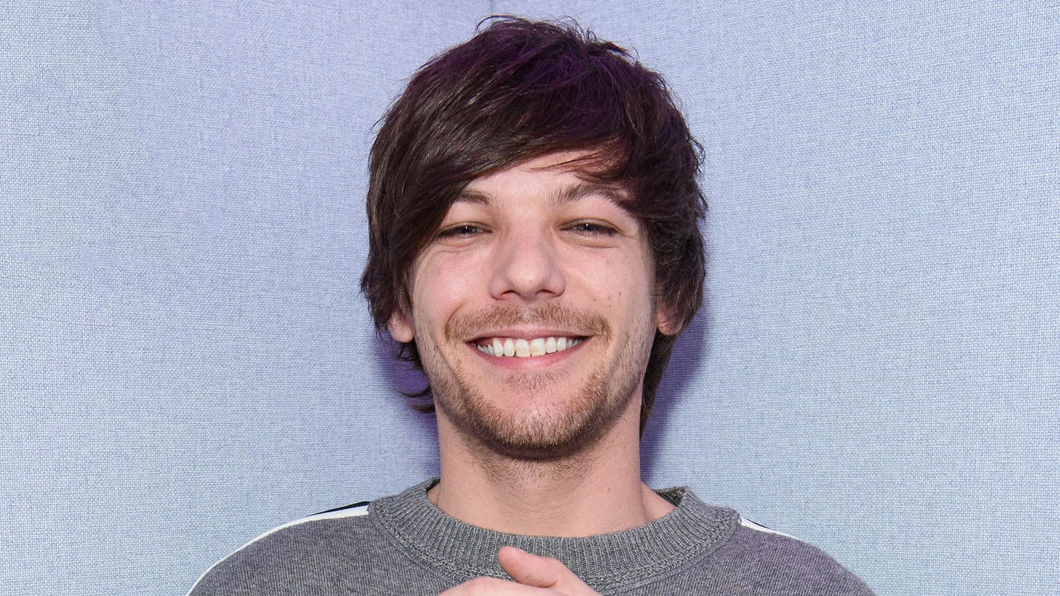 Louis Tomlinson helps to raise thousand of pounds for charity with 'Two ...