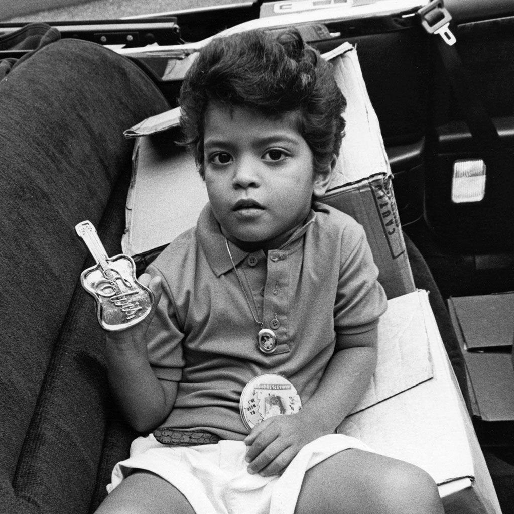 Bruno Mars in 1990 at the age of five working as an Elvis impersonator