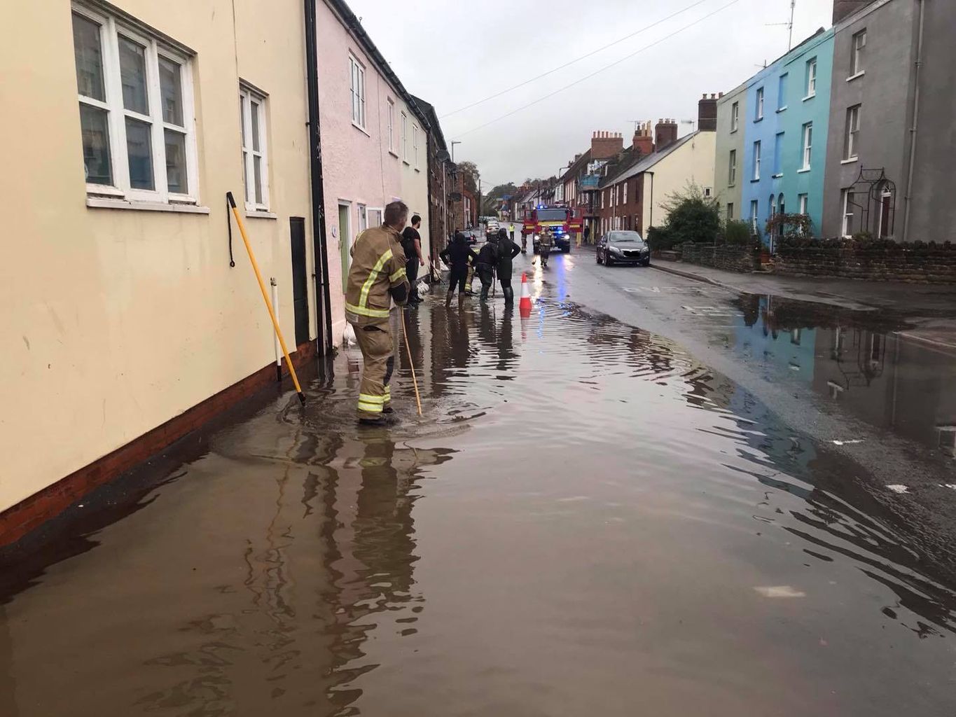 Heavy rain causes flooding in Bridport with homes affected.