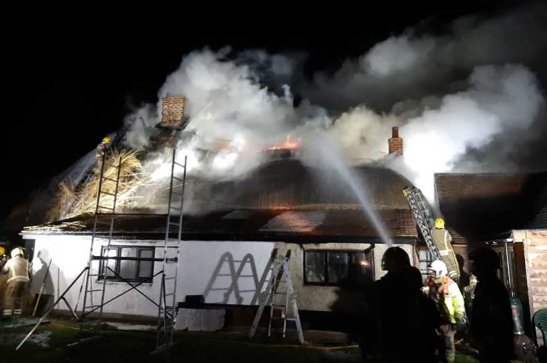 More than 80 firefighters tackle thatched cottage fire | News ...