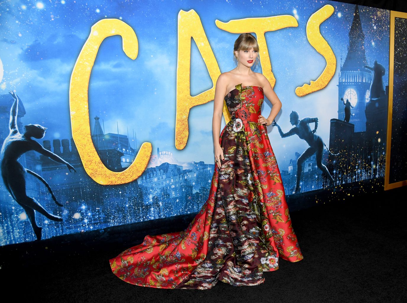 Taylor Swift poses on the red carpet for the film premiere of Cats