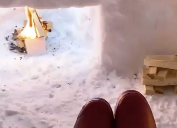 Watch This Aberdeen Mum and daughter built an igloo WITH A FIRE PLACE