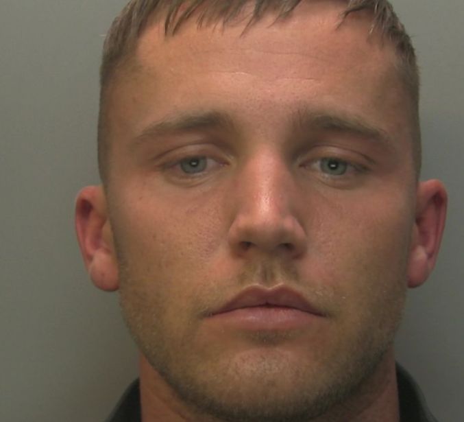 Surrey Police search for wanted man from Byfleet