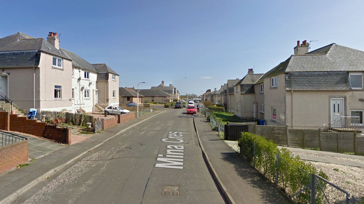 Homes evacuated and armed police called as man barricaded in Fife flat