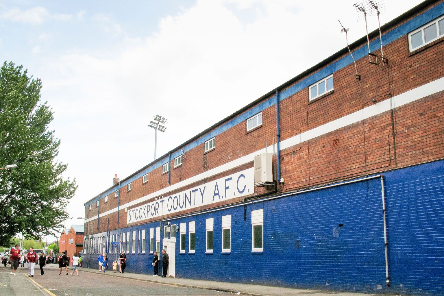 Open top bus parade through Stockport to celebrate County's historic