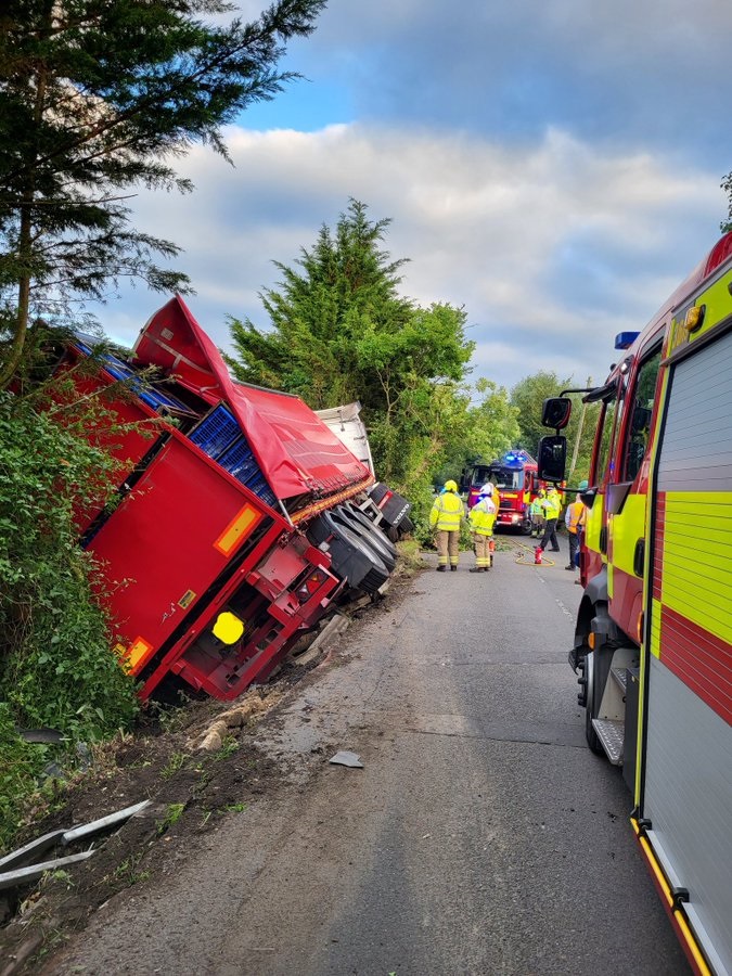 Driver rescued after lorry full of turkeys ends up in ditch near ...