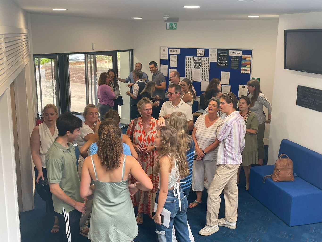 Parents and students gathered for A-level results at Woodbridge School 