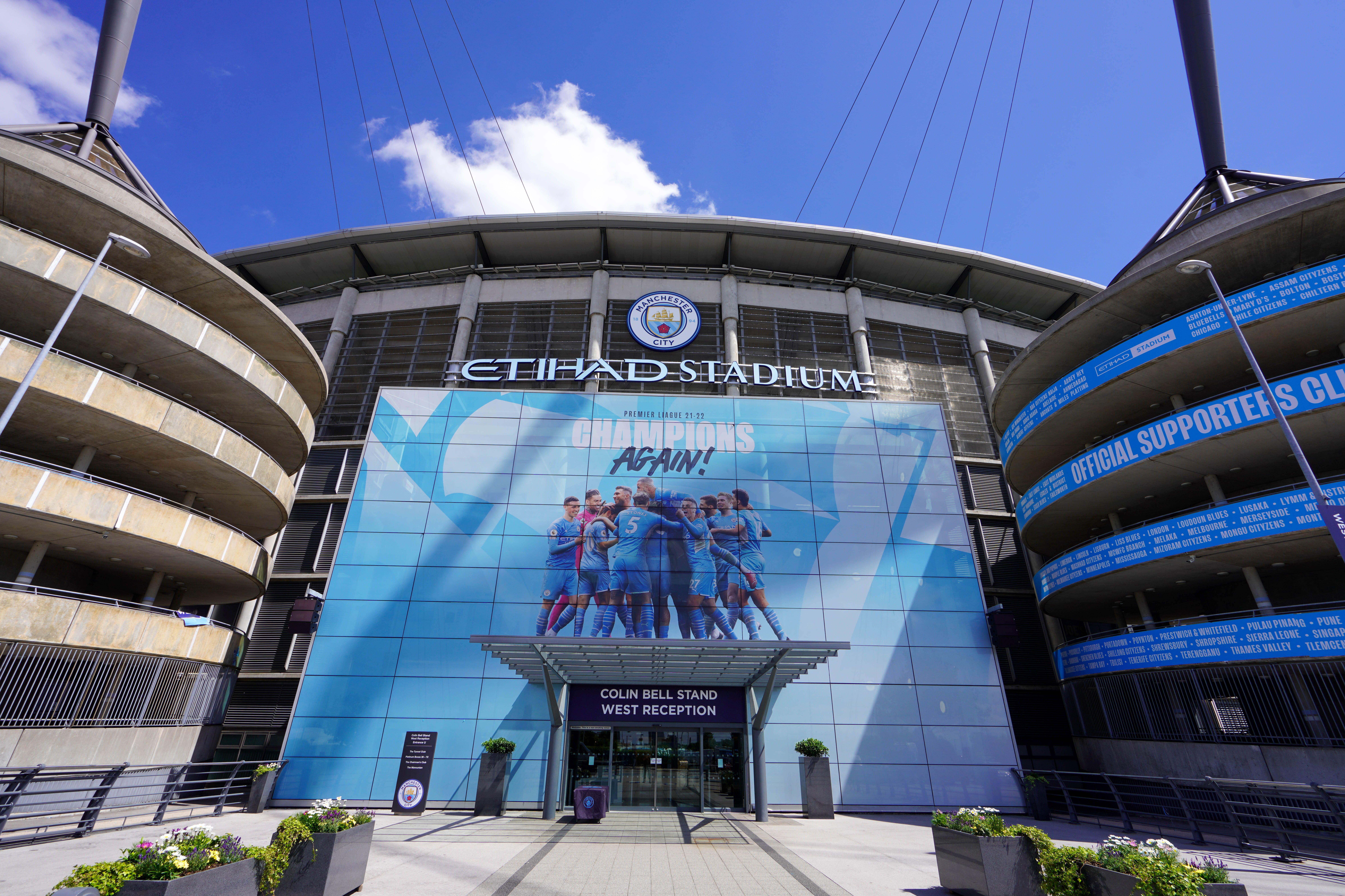 Man City fined over £250k after pitch invasion to celebrate Premier ...