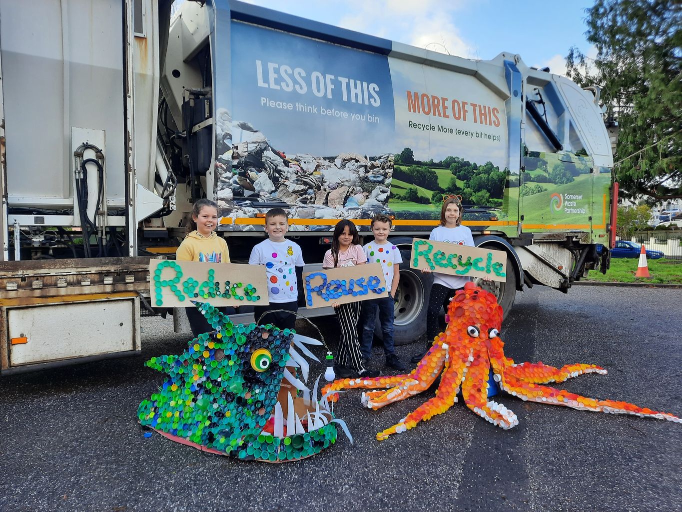 Recycled milk bottle top sculptures given new home
