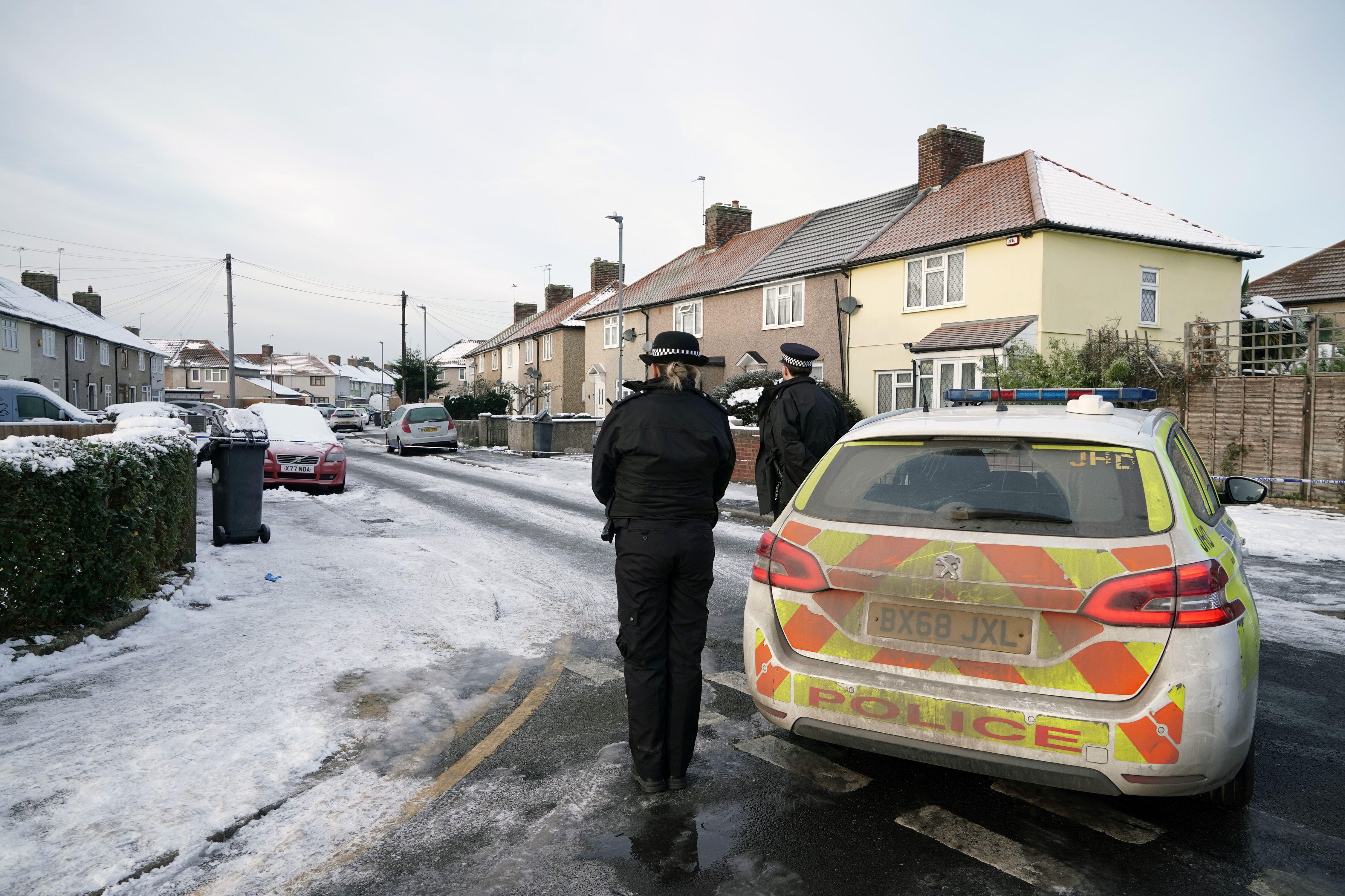 Woman charged with murder of two children in east London