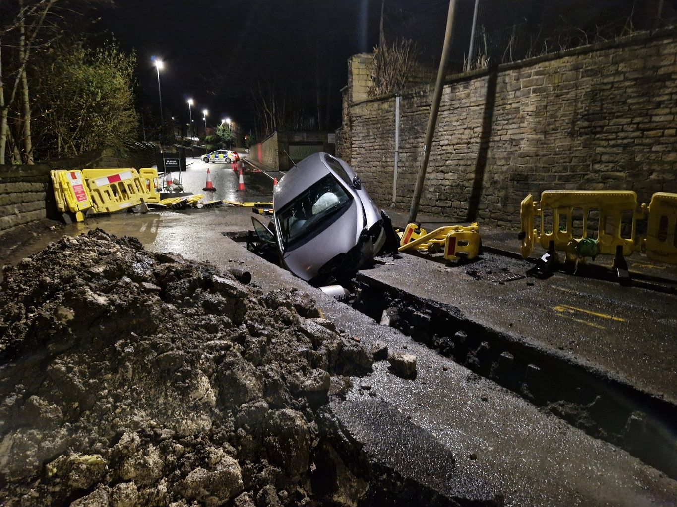 Car Crashes Into Roadworks Hole In Huddersfield 6214