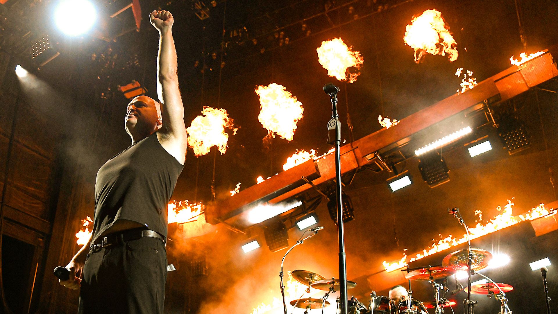 Watch: Disturbed get drenched for second time as pyro sets off ...