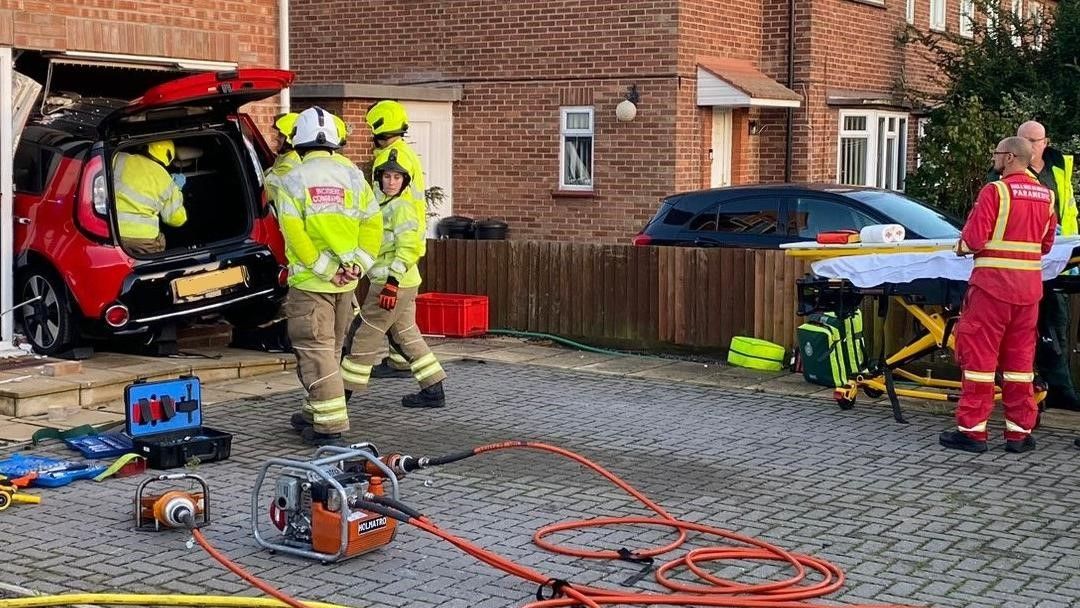 Man rescued after car crashes into the front of Colchester house