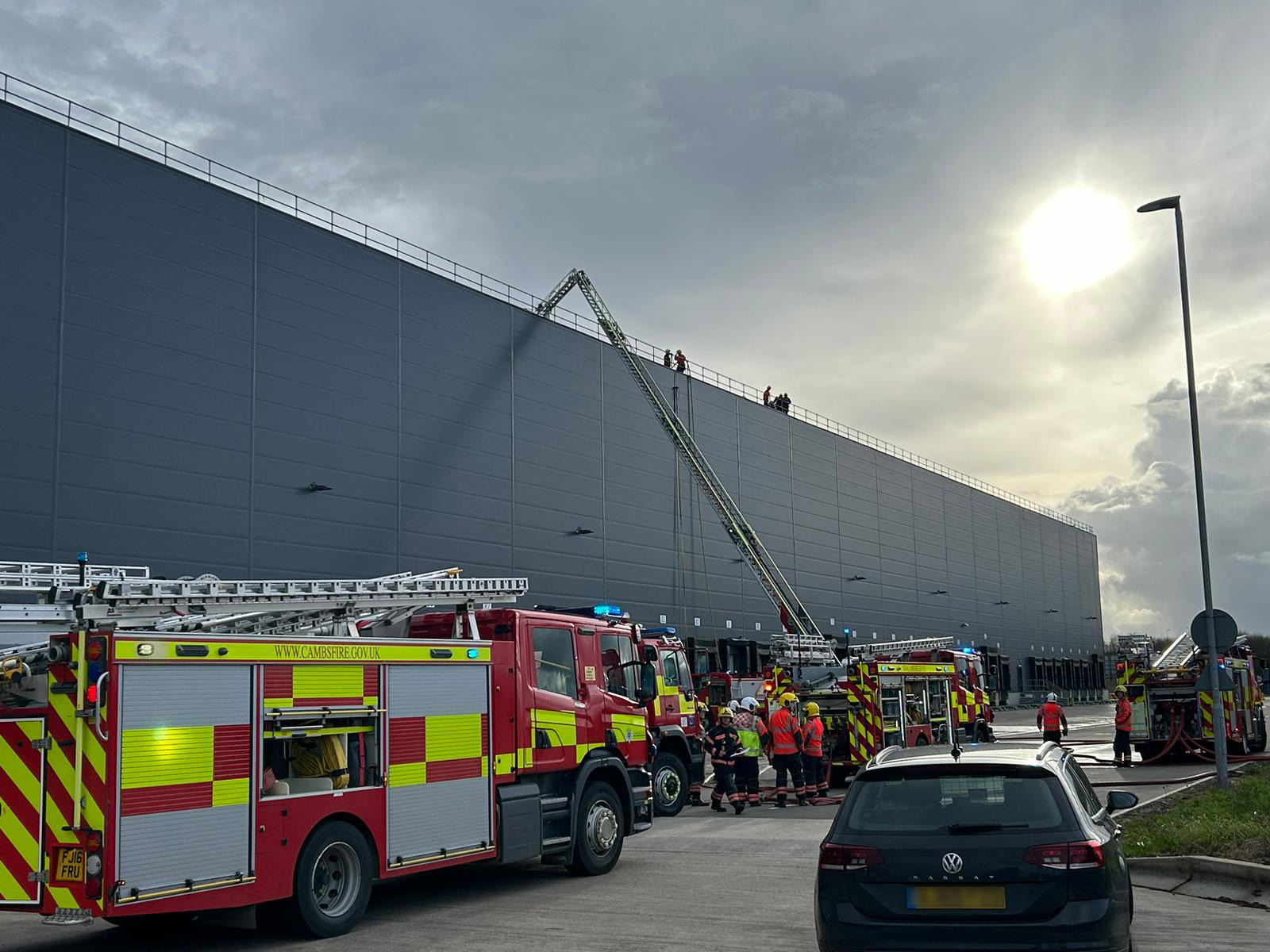 Over 50 firefighters tackle fire on roof of Lidl building in Peterborough