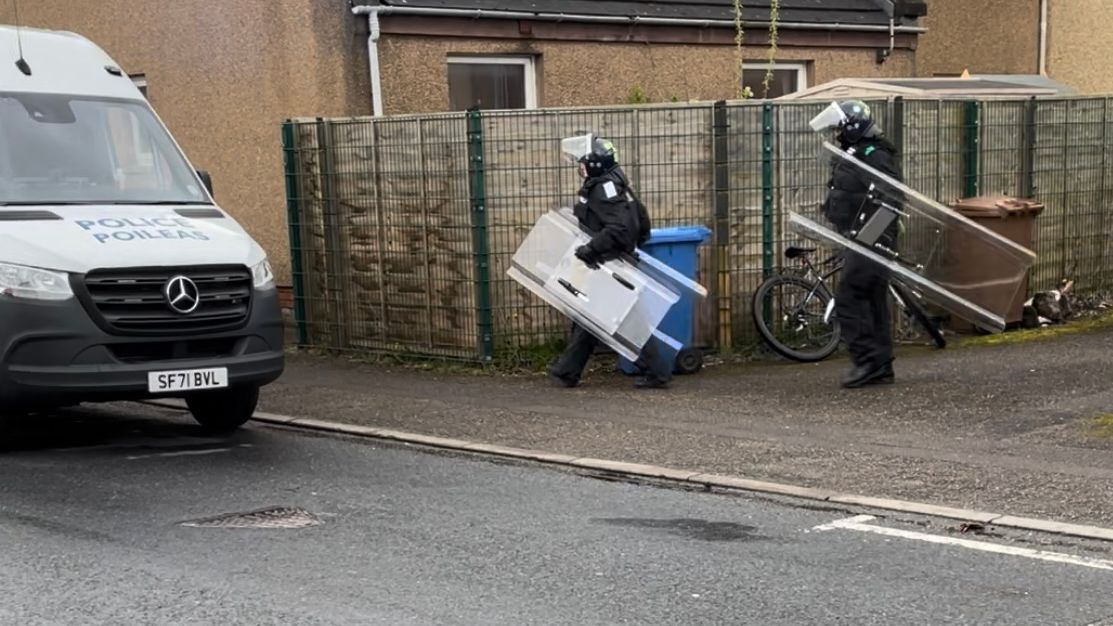 Inverness Riot Police Police armed with shields seen at Inverness property amid 'stand-off ...