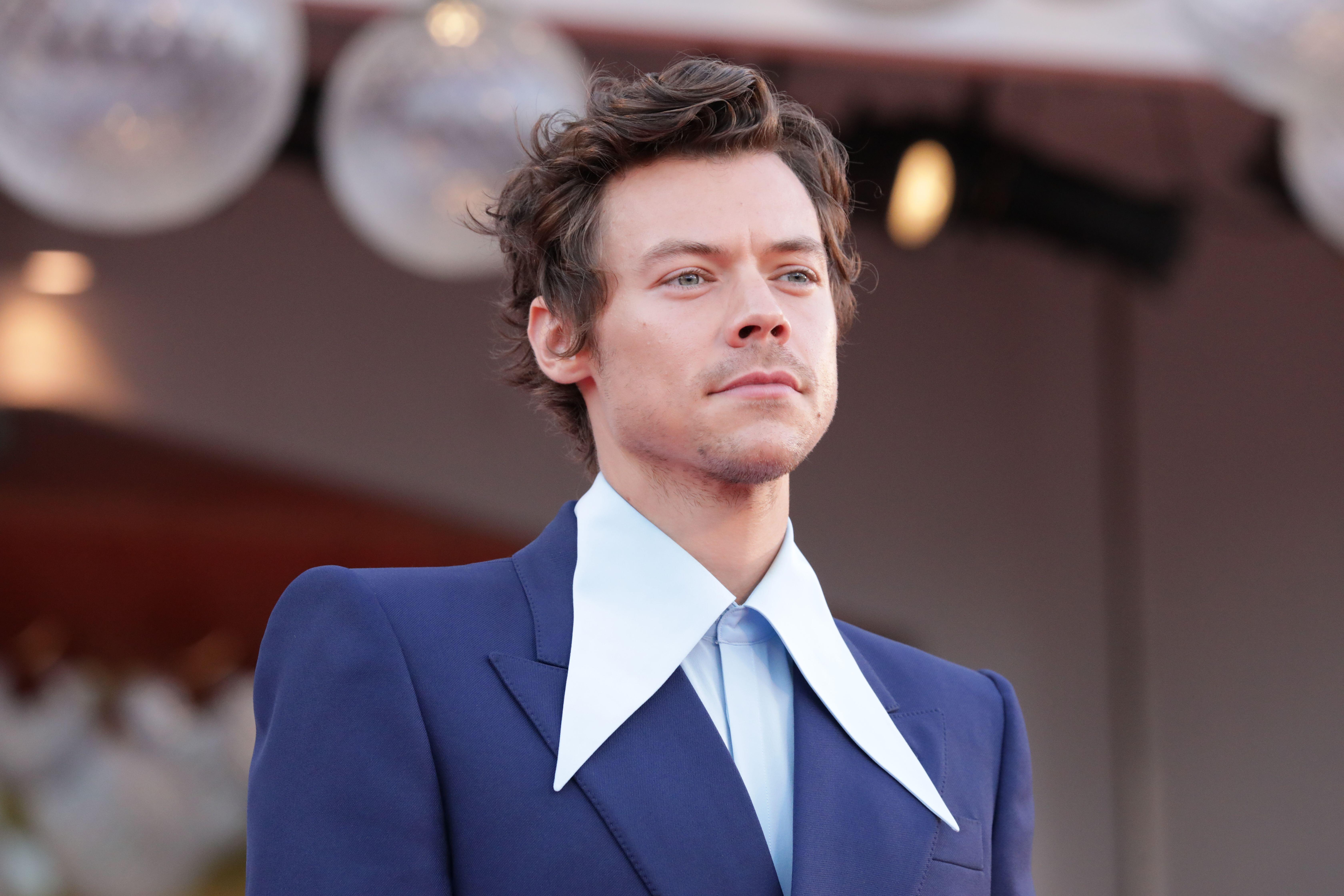 Woman who stalked Harry Styles is jailed and banned from seeing him perform