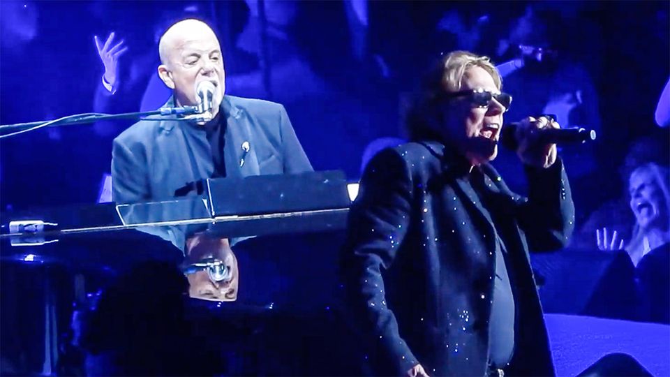 Axl Rose on stage with Billy Joel