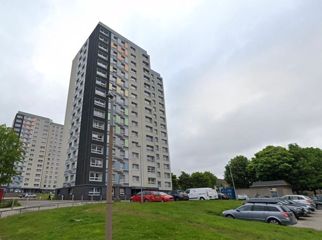 One Arrested After Man Found Seriously Injured Outside Block Of Flats 