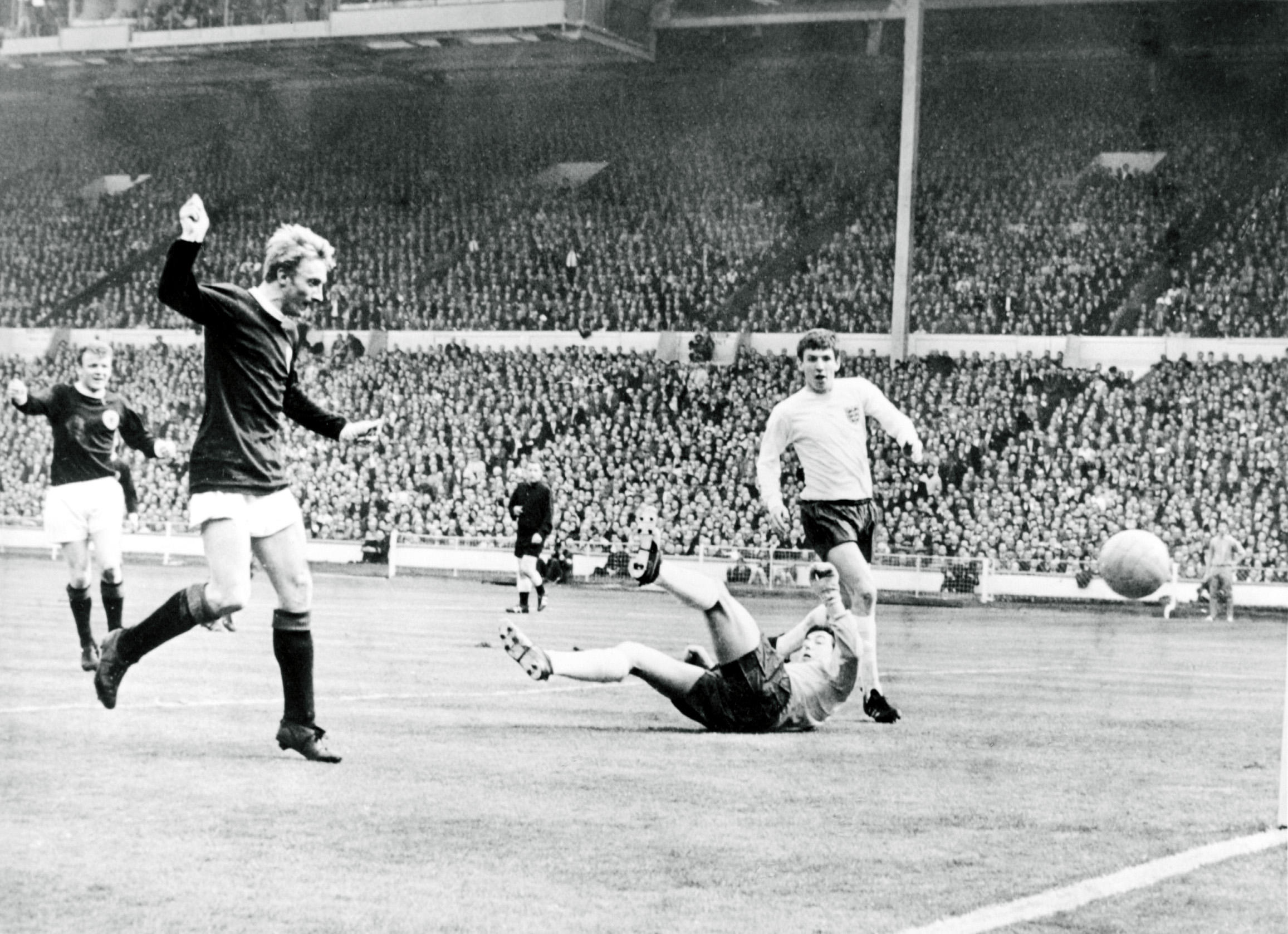 Funeral held for Scottish football legend Denis Law in Manchester.