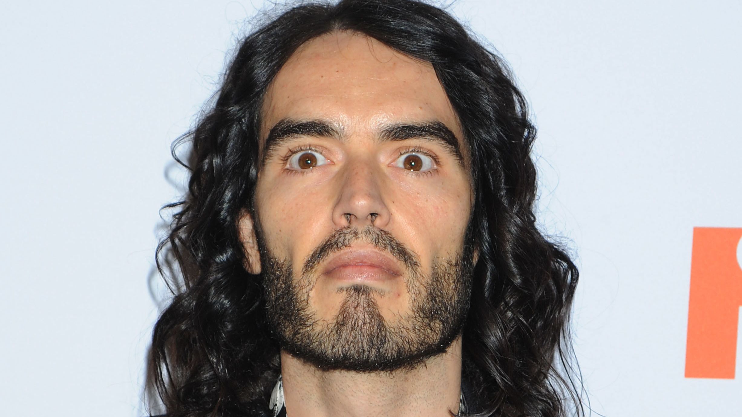Russel Raper Russell Brand charged with rape, indecent assault and sexual assault