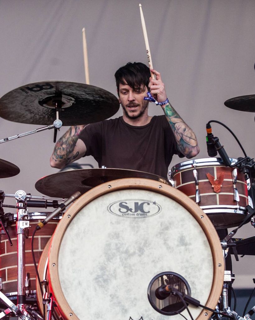 Daniel Williams playing drums with The Devil Wears Prada