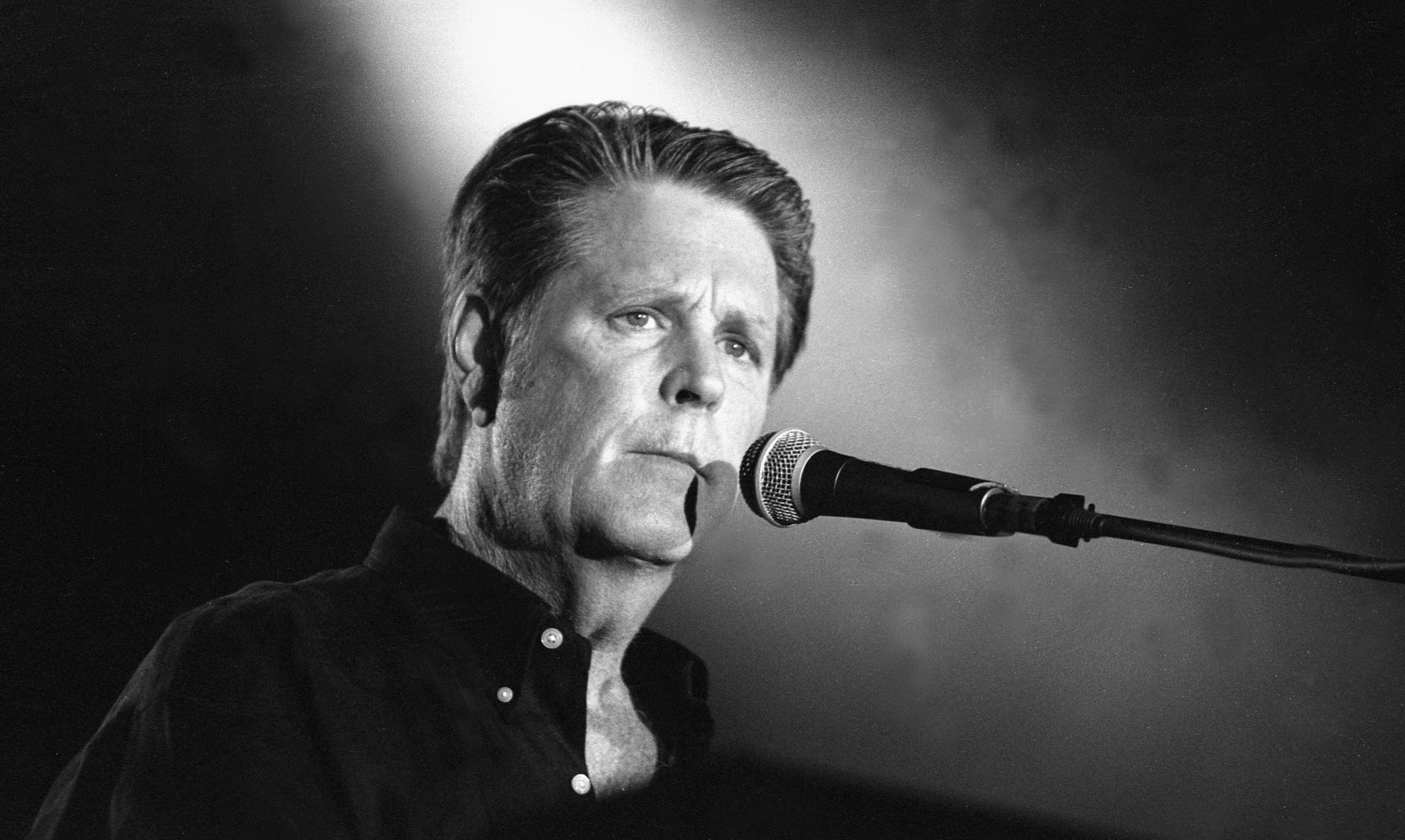 Brian Wilson with a microphone