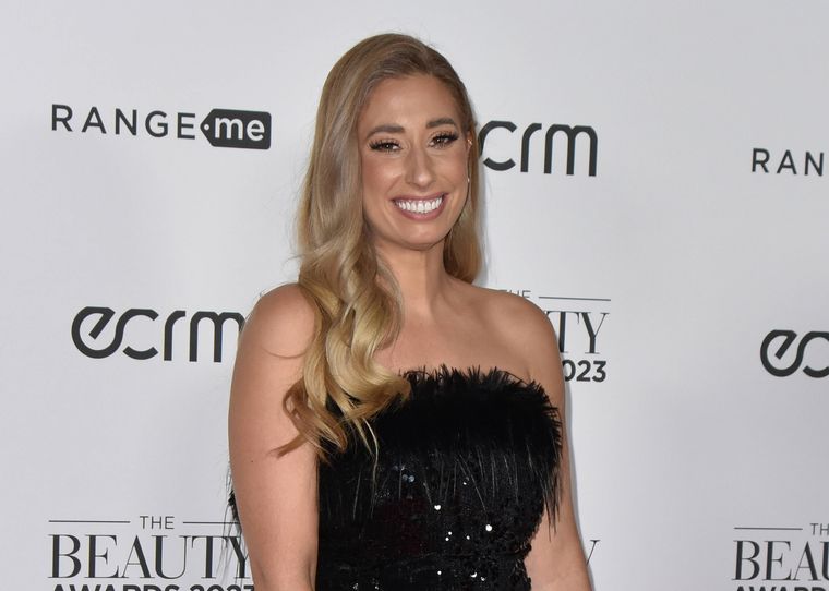 Stacey Solomon wearing a black dress on the red carpet