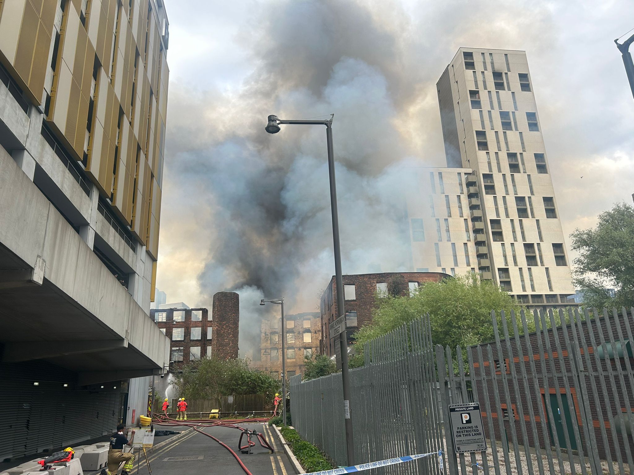 Major fire closes roads and blocks train lines in Manchester City Centre
