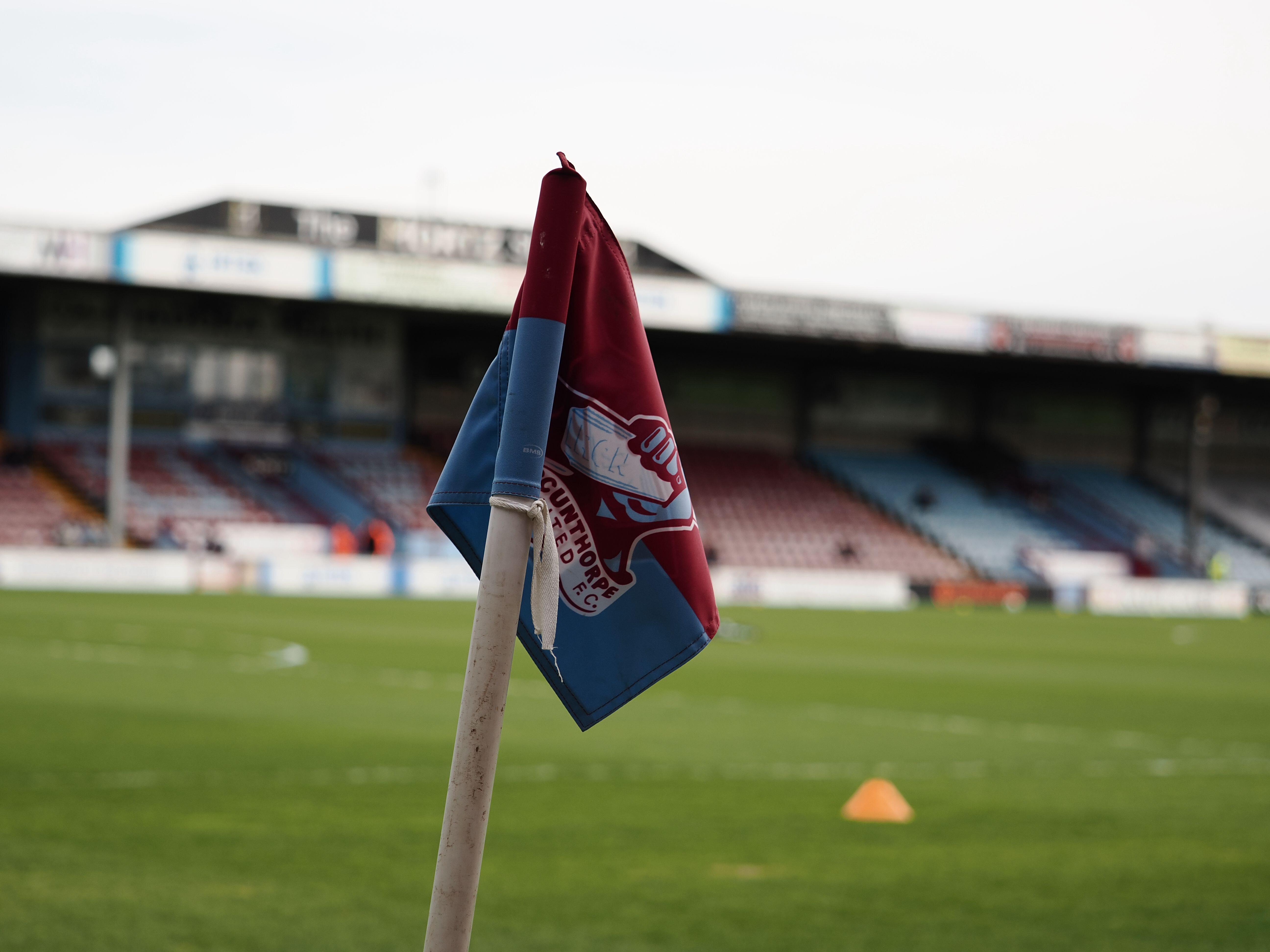 Scunthorpe's clash with Eastleigh abandoned after head injury scare