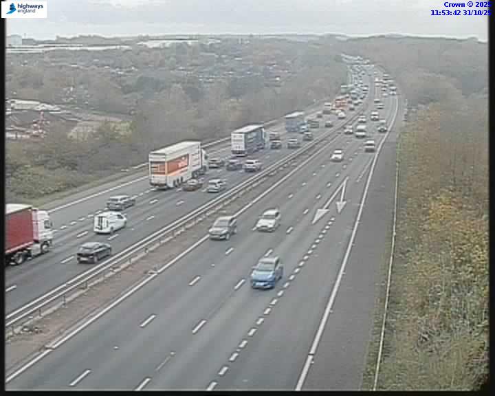 Man rushed to hospital after car flips on M62