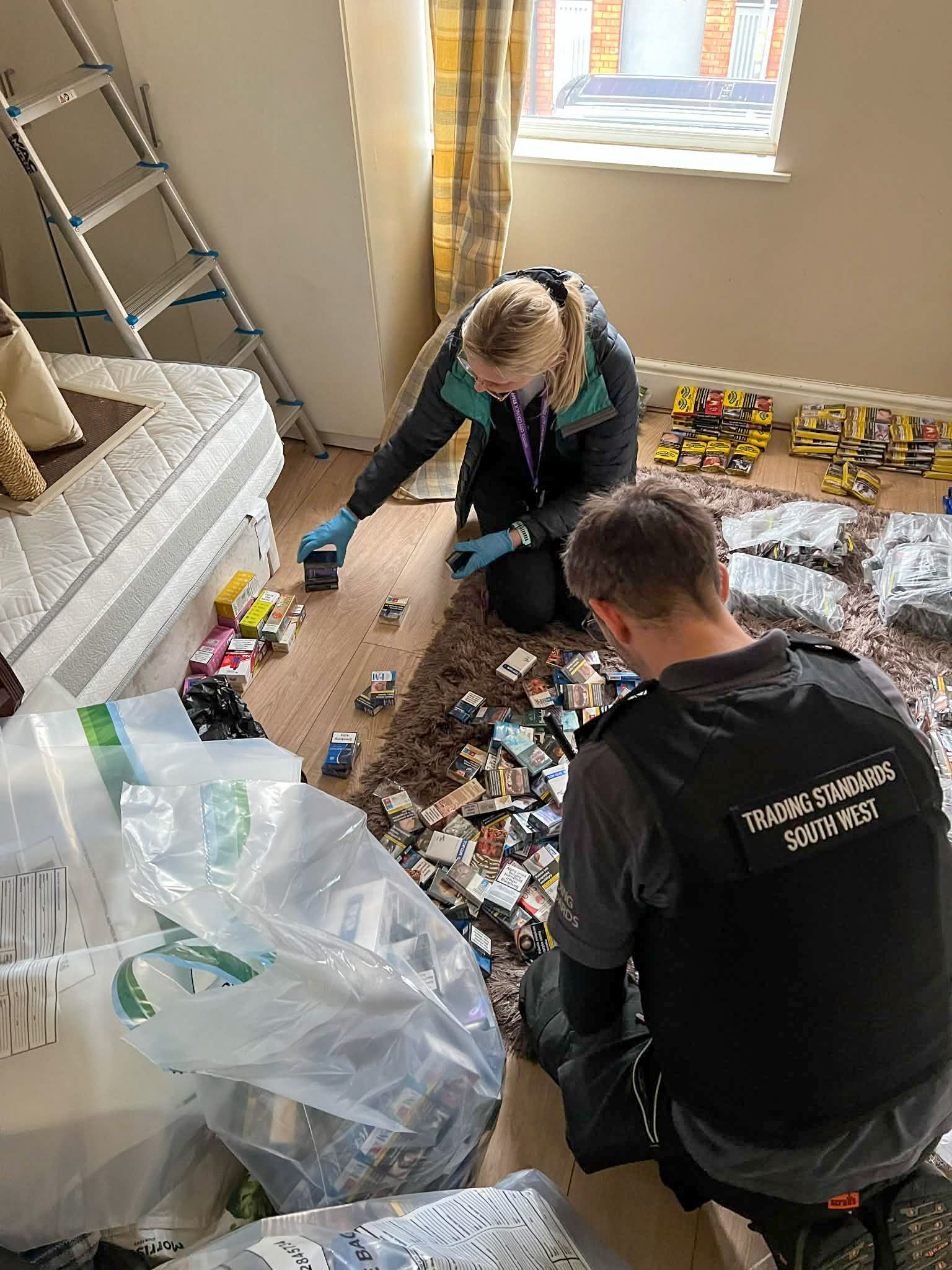 Three arrested after police seize large amount of illegal tobacco and ...