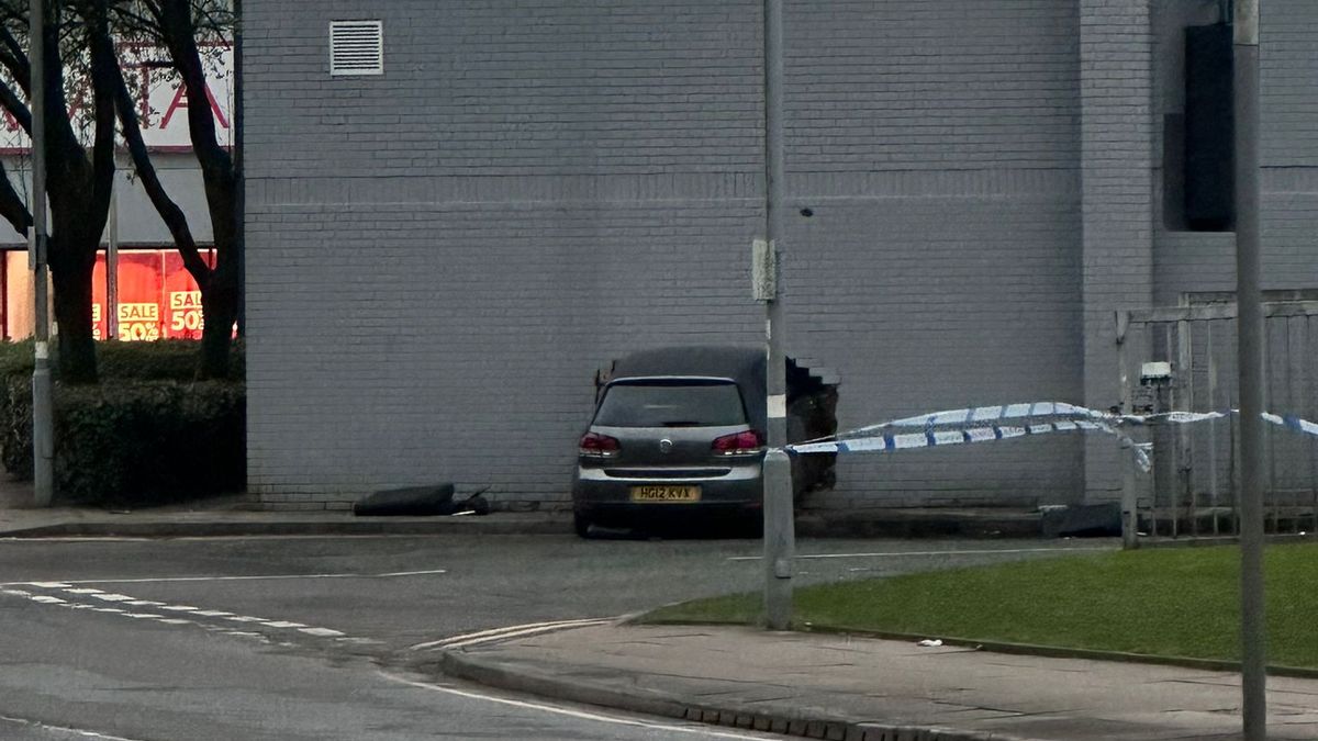 Two injured as car ploughs into JD Gyms building in Bury