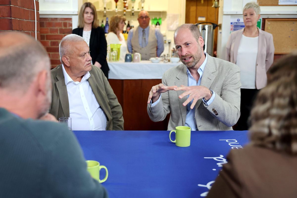 William comforts mental health charity user on Norfolk visit