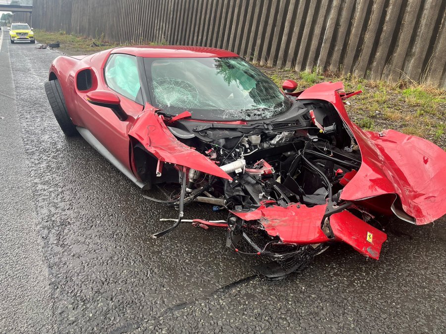 Ferrari 296 wrecked after driver loses control on wet M602 in Salford; police say 'no injuries luckily'