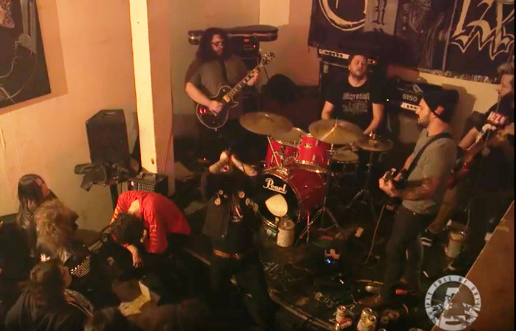 Fan sleeping on stage through doom metal band's set becomes Internet hit |  Music - Kerrang! Radio